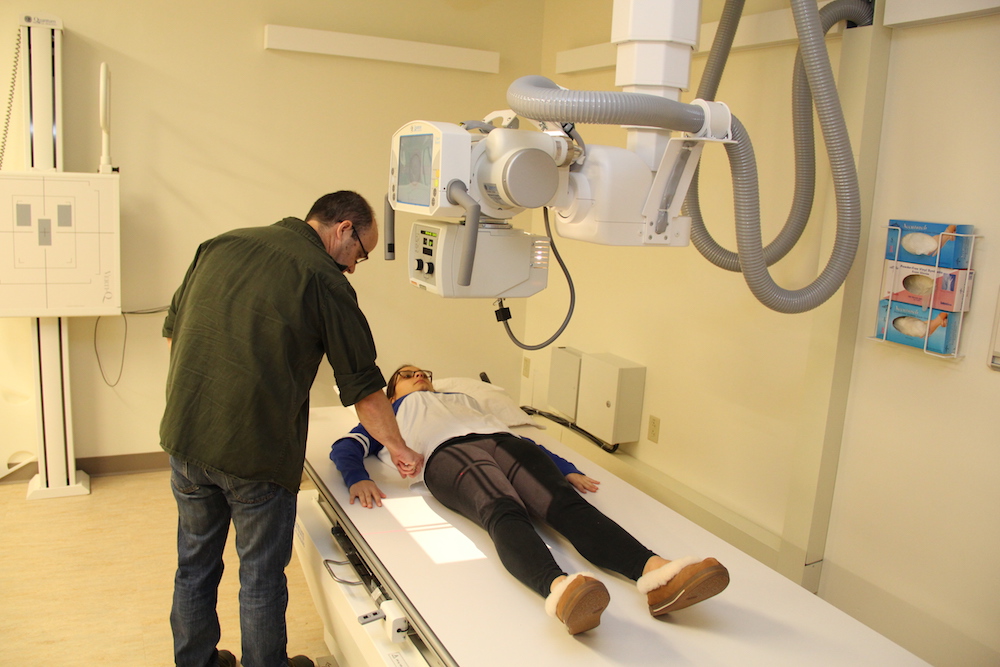 Radiologic technology students practice correct positioning