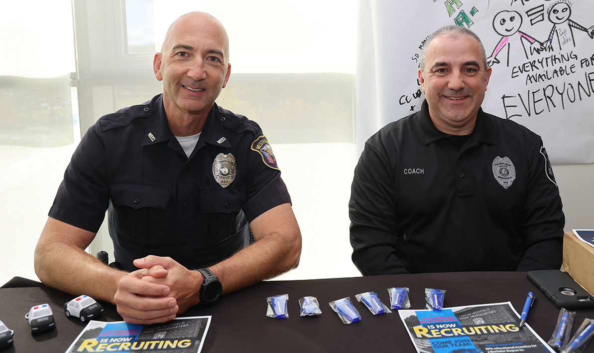 Westfield police officers John Blaskcak '93 and Chris Coach '97 during a recent visit to HCC